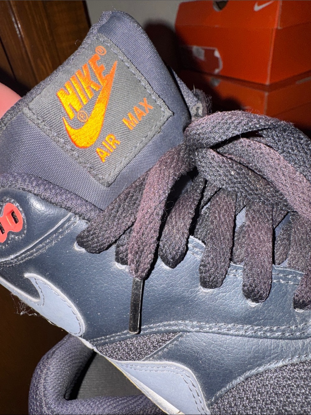 Nike Gray and Black Sneakers with Orange Accents